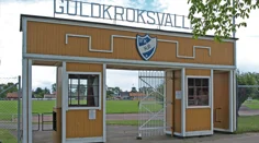 Gulmålad entrébyggnad till indrottsplats